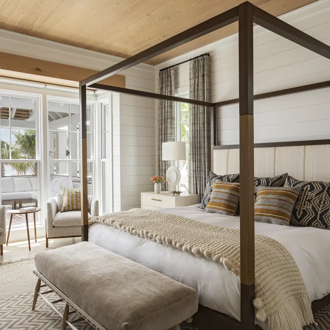 Primary bedroom in a custom coastal home
