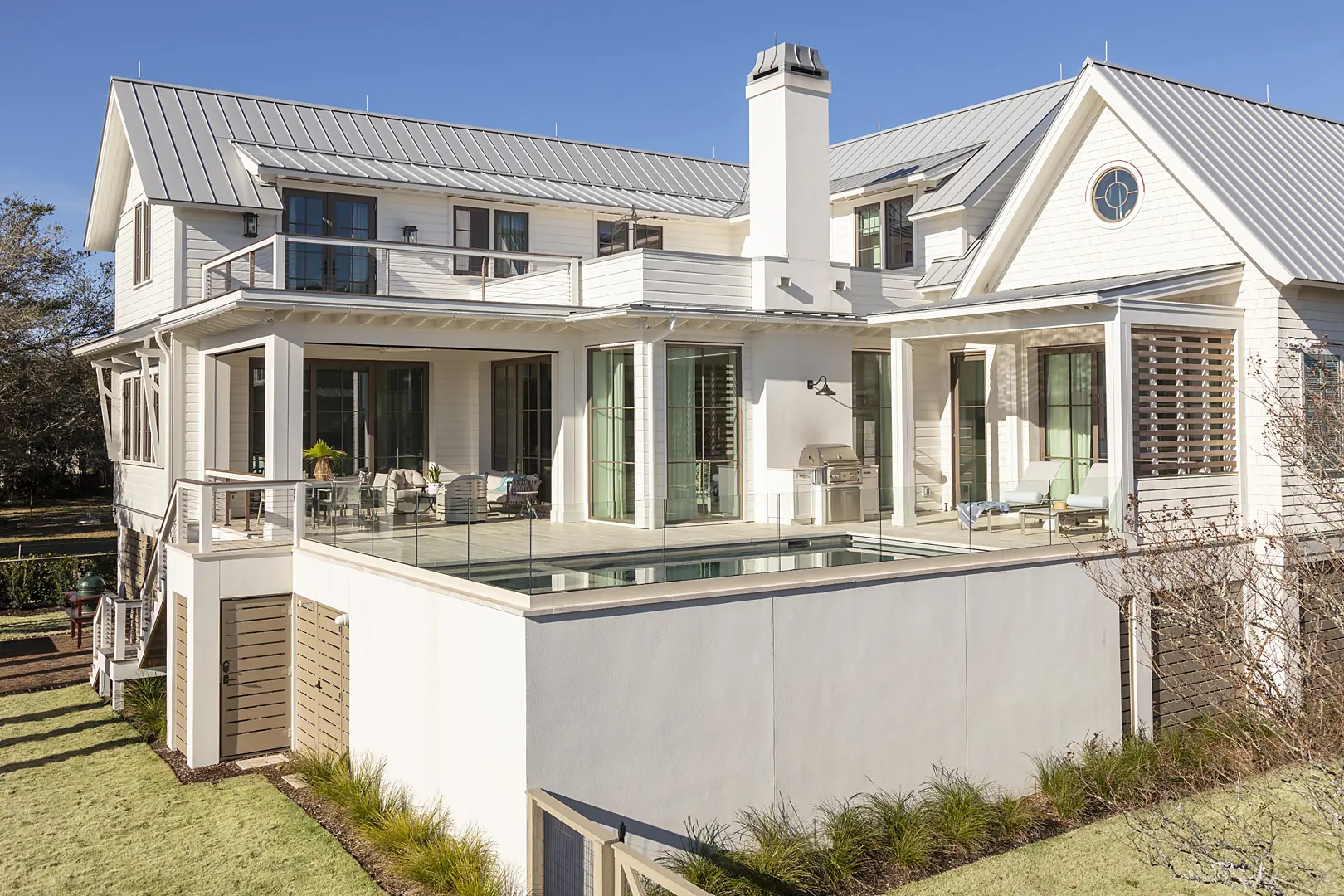 Rear exterior and pool of a custom home built by Phillip Smith General Contractor