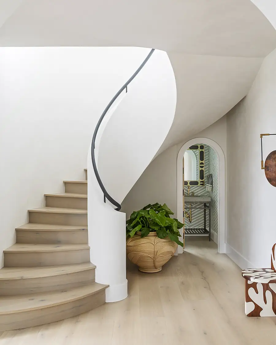 Hand-built curved staircase in a custom home