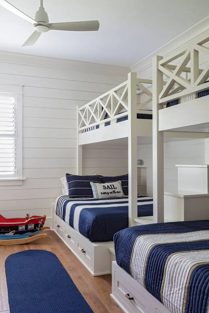 Built-in bunk room with navy bedding