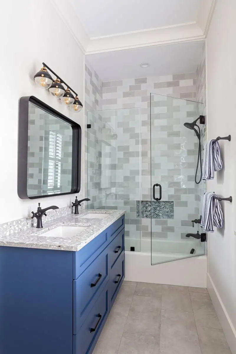 Bath with bold blue double vanity